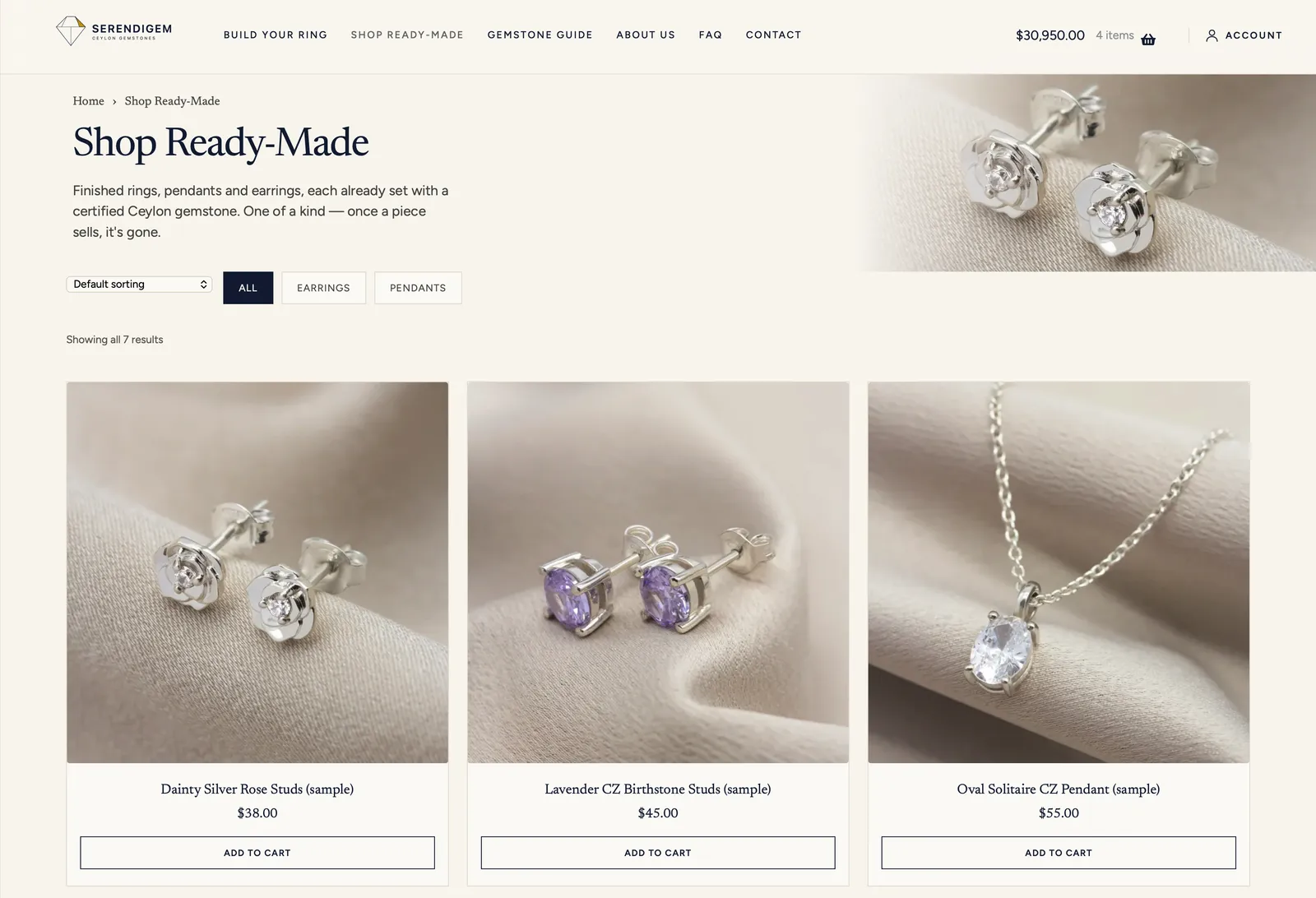 Shop Ready-Made page with earrings and pendants on silk backgrounds